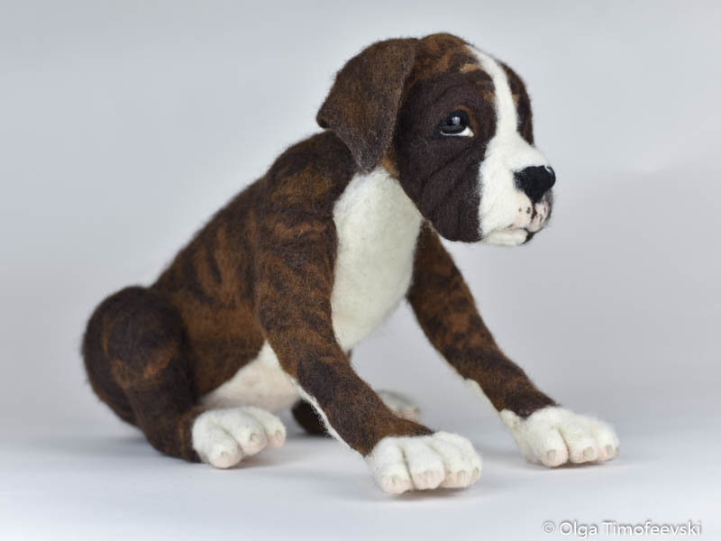 Lifelike and life-size sculpture of Boxer pup handmade of wool