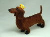 Queenie, needle felted dachshund wearing a crown